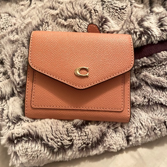 Coach Handbags - Coach crossgrain leather wallet. New with tags. Light salmon color.